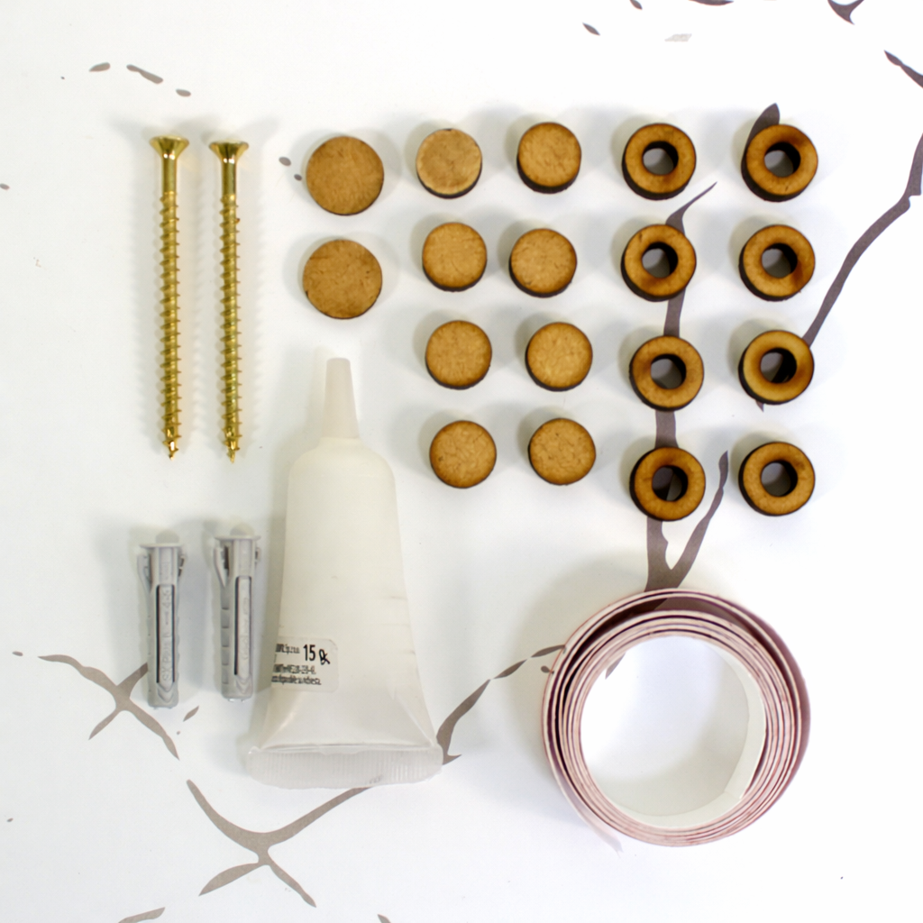 Kit instalación tornillos, tacos, separadores, pegamento, embellecedor y cinta métrica