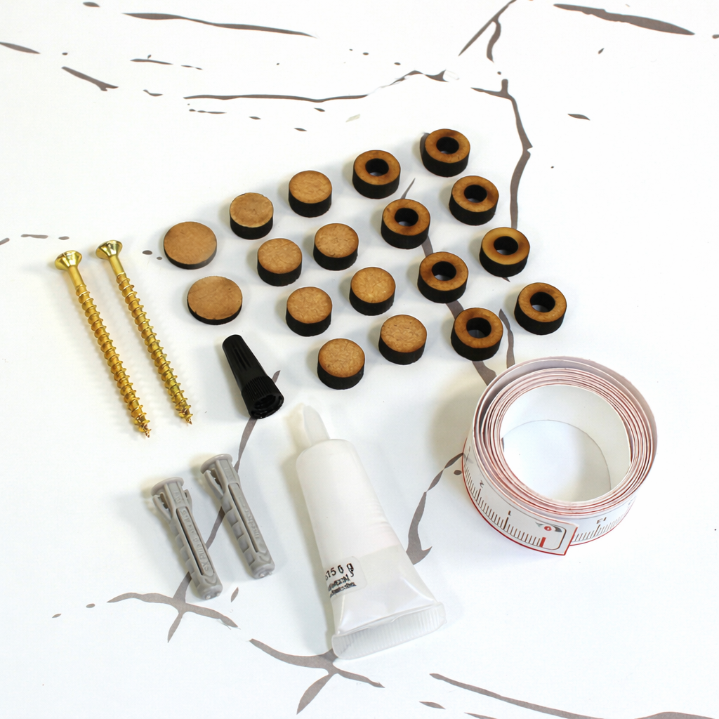 Kit instalación tornillos, tacos, separadores, pegamento, embellecedor y cinta métrica