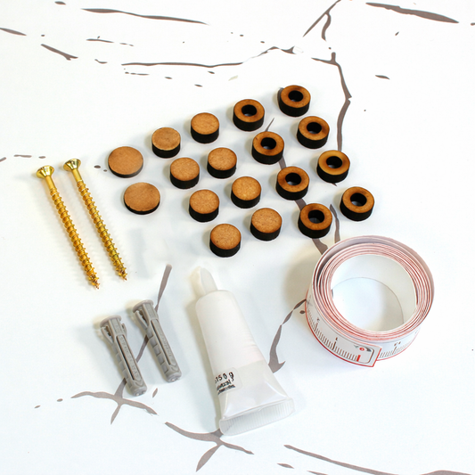 Kit instalación tornillos, tacos, separadores, pegamento, embellecedor y cinta métrica