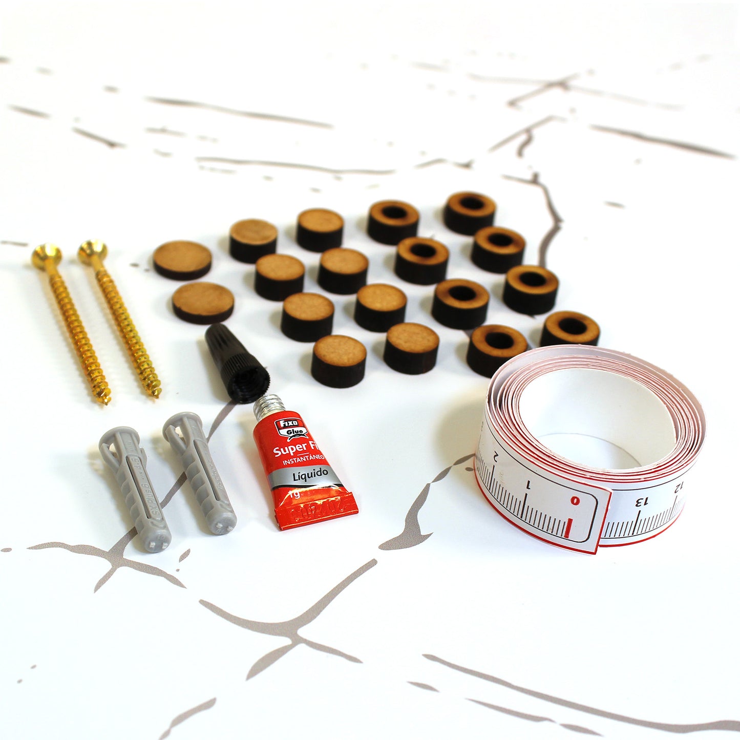 Kit instalación tornillos, tacos, separadores, pegamento, embellecedor y cinta métrica